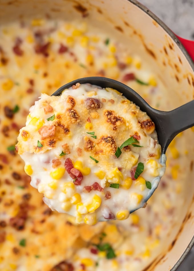 ladel of creamed Corn Recipe with Bacon, Parmesan, and Mascarpone 