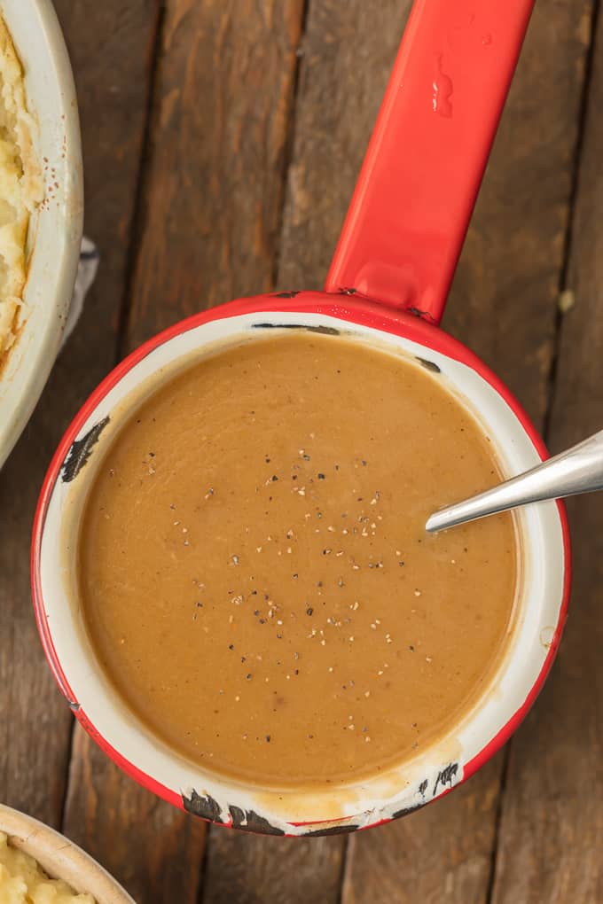 Make ahead gravy in a red bowl