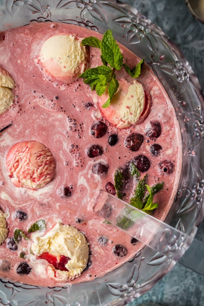 Large punch bowl filled with cherry vanilla ice cream punch