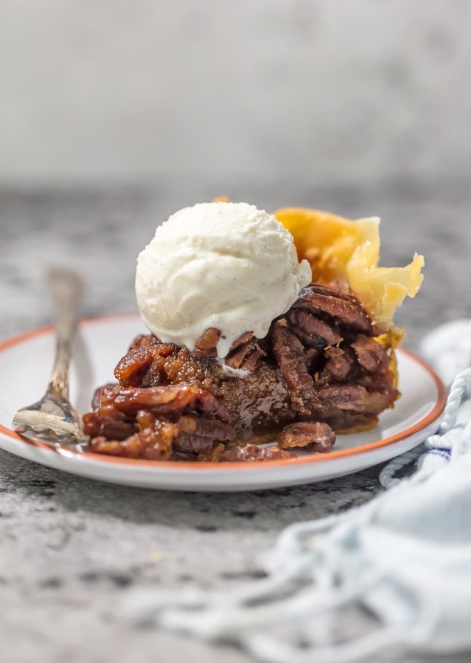 a slice of easy pecan pie with ice cream