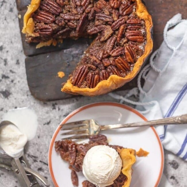 Crock Pot Pecan Pie is such an EASY Pecan Pie Recipe, you won't believe you taste buds! This SLOW COOKER PECAN PIE will knock your socks off and make for a delicious and easy Thanksgiving, Christmas, or Easter! This is the BEST Pecan Pie Recipe we have ever tasted, and it just so happened to be made in a slow cooker. Win win!