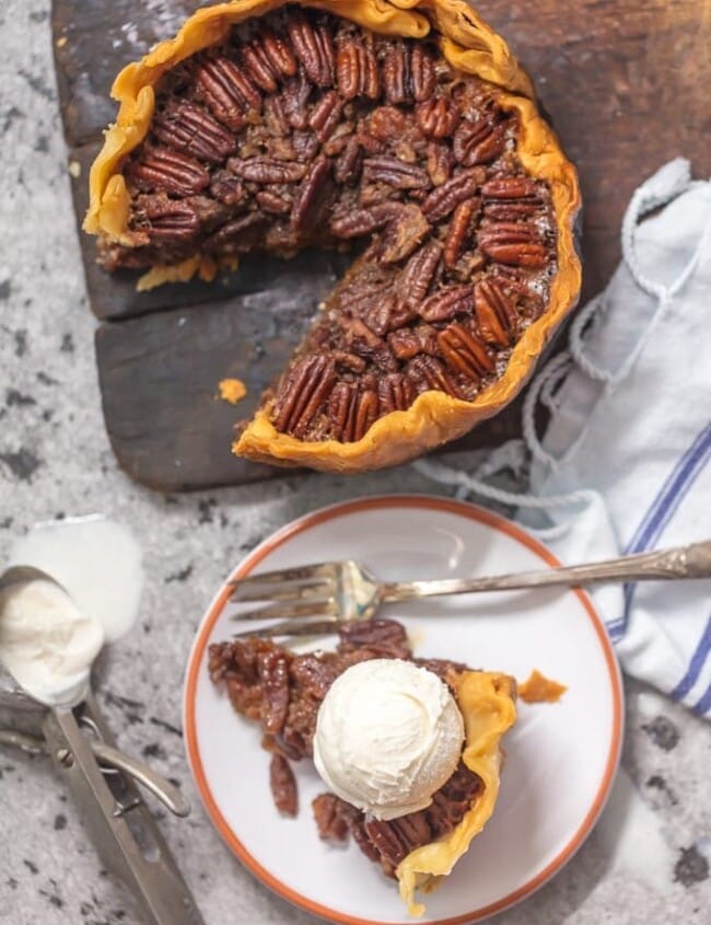 Crock Pot Pecan Pie is such an EASY Pecan Pie Recipe, you won't believe you taste buds! This SLOW COOKER PECAN PIE will knock your socks off and make for a delicious and easy Thanksgiving, Christmas, or Easter! This is the BEST Pecan Pie Recipe we have ever tasted, and it just so happened to be made in a slow cooker. Win win!