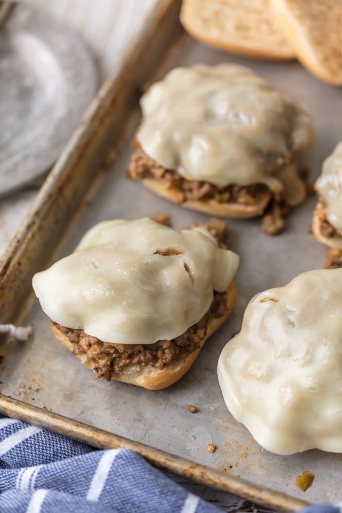 philly cheesesteak sloppy joe recipe on a baking sheet with melted cheese