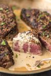 This BEST EVER SKILLET STEAK is smothered in a Peppercorn Cream Sauce fit for a king. This restaurant style steak is so easy to perfect right in your own home. The only way we cook filet mignon!