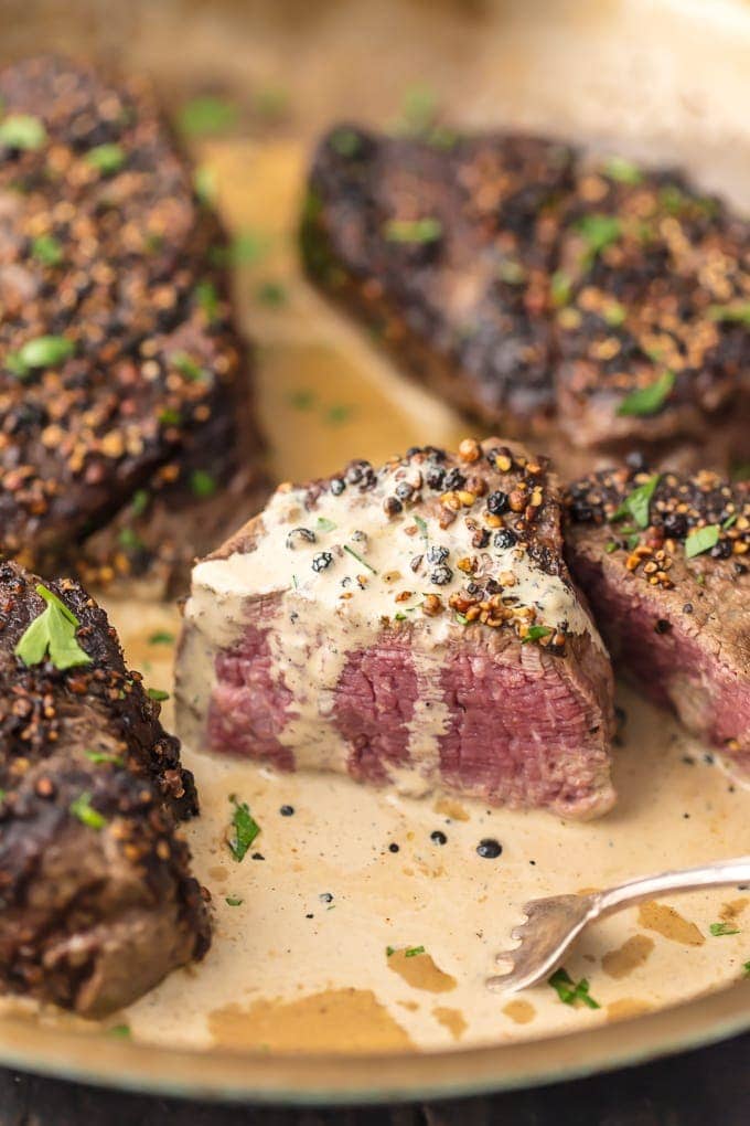 steak covered in peppercorns and brandy cream sauce.