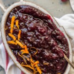 This Homemade Cranberry Sauce Recipe with Orange Liqueur is our favorite fresh cranberry sauce to make for Thanksgiving! This SPIKED CRANBERRY SAUCE is a fun twist on a classic Thanksgiving recipe. No holiday table is complete without cranberry sauce, and this easy Homemade Cranberry Sauce is extra delicious and amazing! We call them "sauced" cranberries.