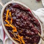 This Homemade Cranberry Sauce Recipe with Orange Liqueur is our favorite fresh cranberry sauce to make for Thanksgiving! This SPIKED CRANBERRY SAUCE is a fun twist on a classic Thanksgiving recipe. No holiday table is complete without cranberry sauce, and this easy Homemade Cranberry Sauce is extra delicious and amazing! We call them "sauced" cranberries.