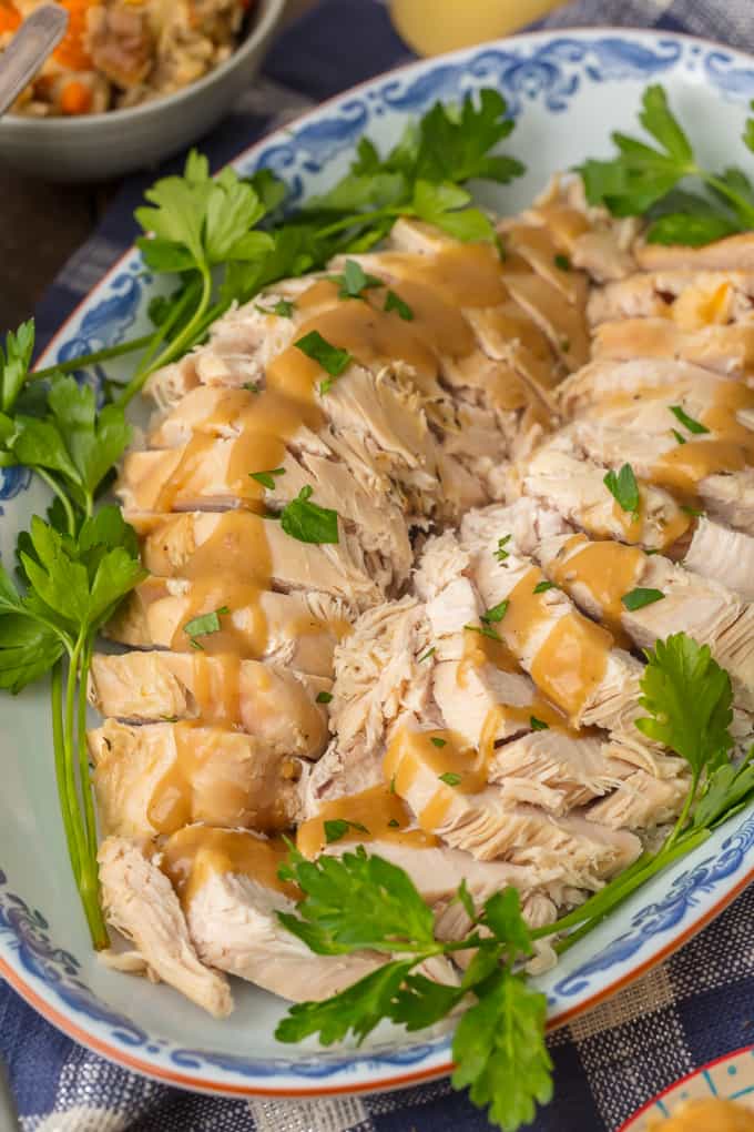Instant Pot Turkey Breast on a blue and white serving platter