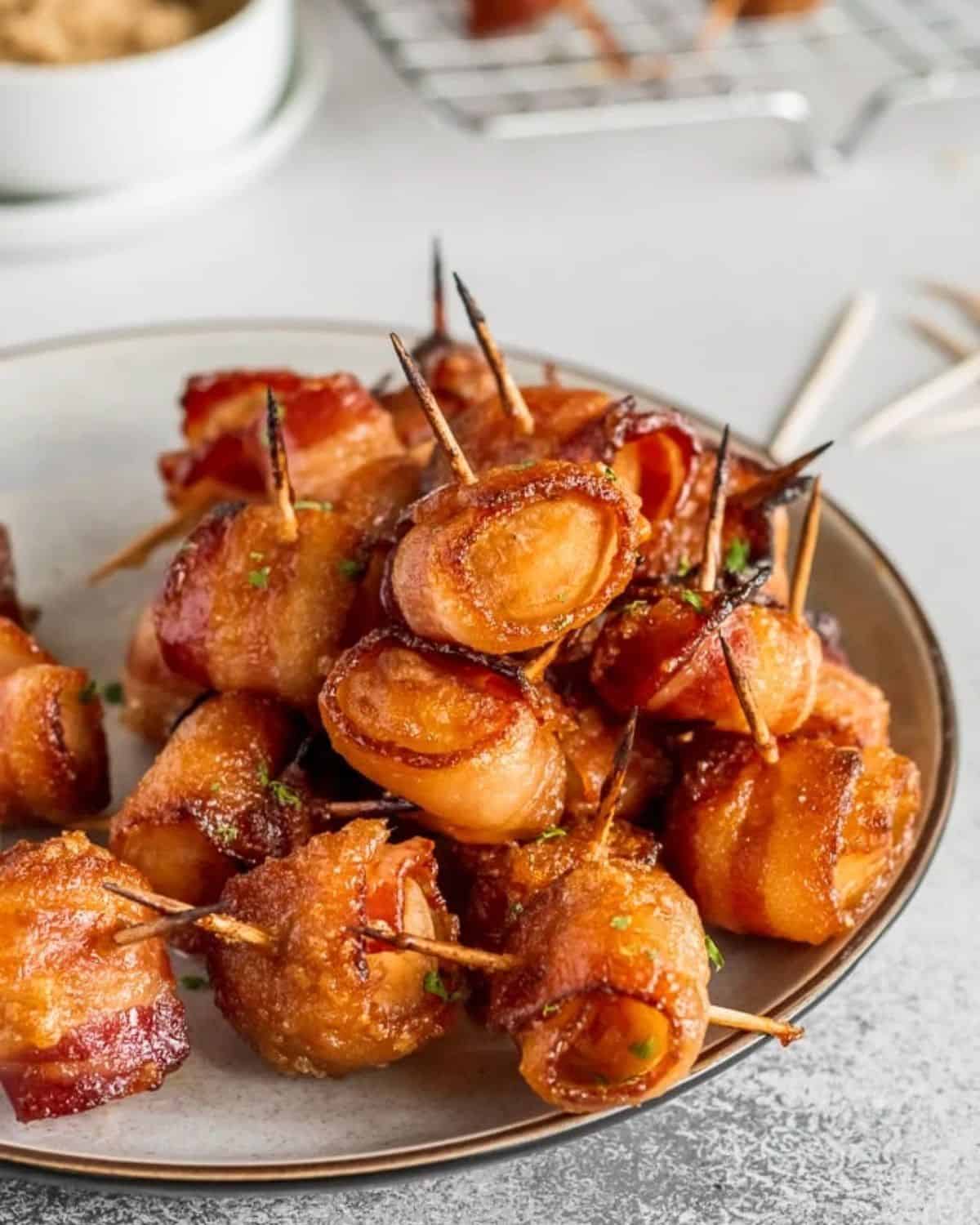 A bowl of bacon wrapped water chestnuts.