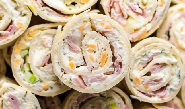 side view of several ham and cheese roll ups