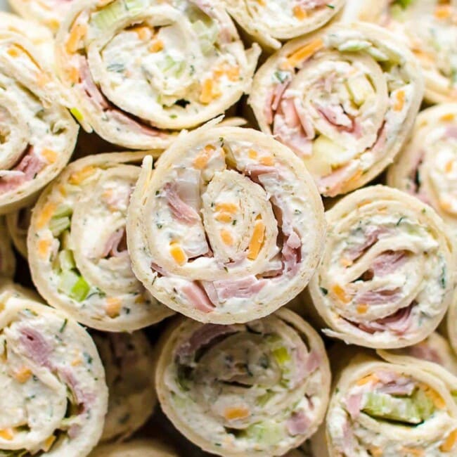 side view of several ham and cheese roll ups