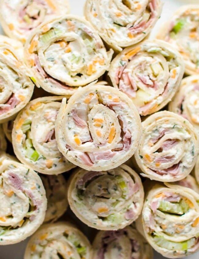 side view of several ham and cheese roll ups