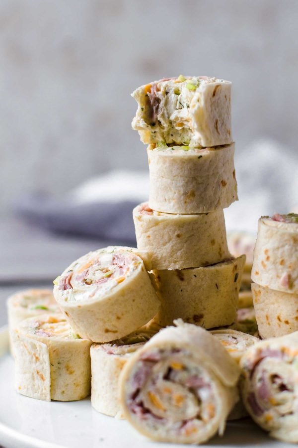 a stack of ham and cheese pinwheels