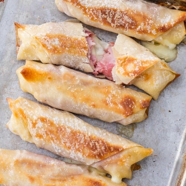 This BAKED MOZZARELLA STICKS RECIPE is filled with delicious Ham & Mozzarella Cheese. These Homemade Mozzarella Sticks are healthier than the traditional fried version. These Ham and Cheese Sticks are a snack you can feel great about feeding your family. So easy and yum!
