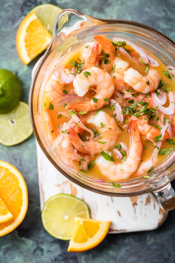 Bowl full of shrimp ceviche marinating in lime juice