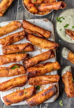 I could eat 50 of these MINI GREEN CHILE CHEESY BEAN TAQUITOS! I just can't get enough. Such a fun and easy appetizer for the holidays or game day. These are always a crowd pleaser.