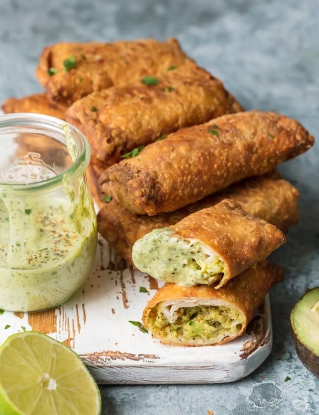 Avocado Egg Rolls on white serving board