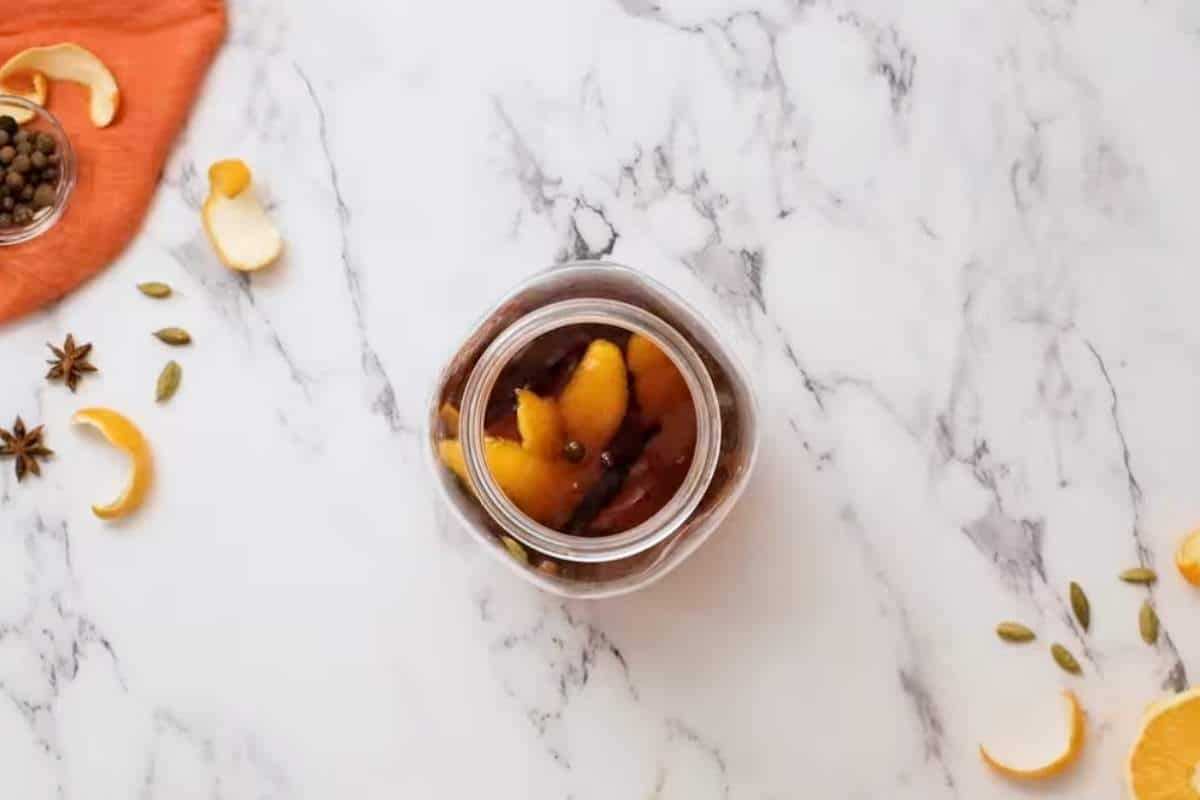 vanilla bean seeds are added to the jar