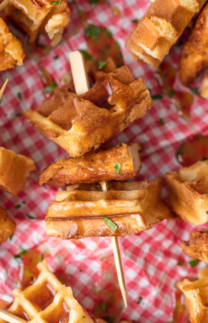 Close up of chicken and waffles on a stick
