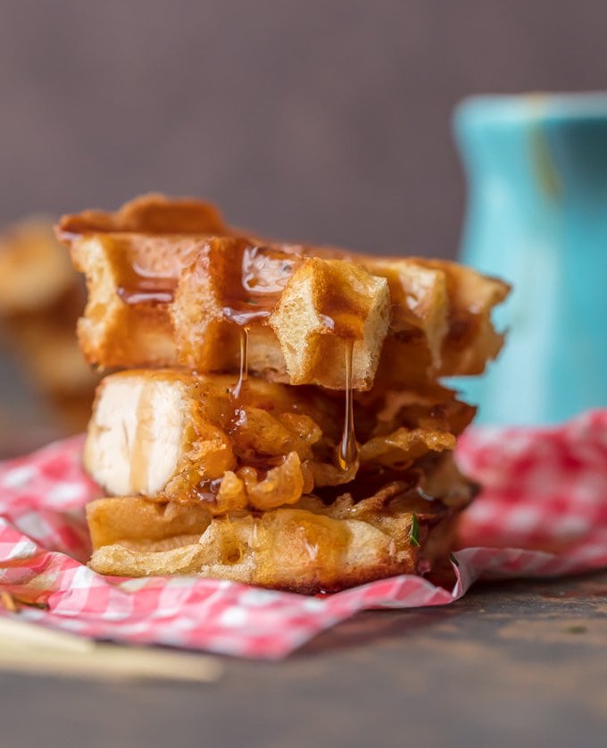 Stack of mini waffles slathered in syrup