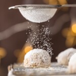 These NUTELLA STUFFED SNOWBALL COOKIES take a classic pecan snowball and kick it up a notch. You better make a double batch because this favorite Christmas cookie goes quick.