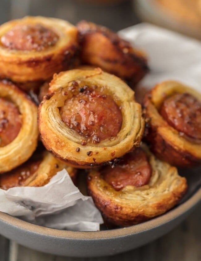 SAUSAGE ROLLS are kind of like Pigs in a Blanket, but I've transformed them into a fun bite-size appetizer! Paired with a sweet & spicy Pepper Jelly, these Mini Sausage Rolls are sure to please. We are addicted to these little sausage rolls and I guarantee they will be gone in minutes. So much flavor for such a small recipe!