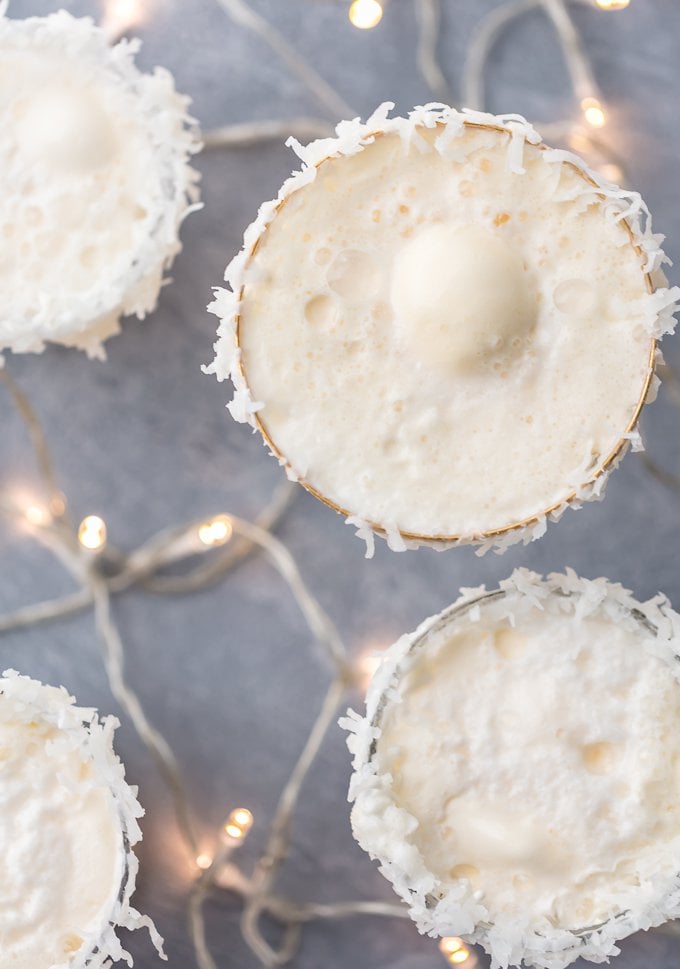 glasses filled with creamy white non-alcoholic Christmas punch 