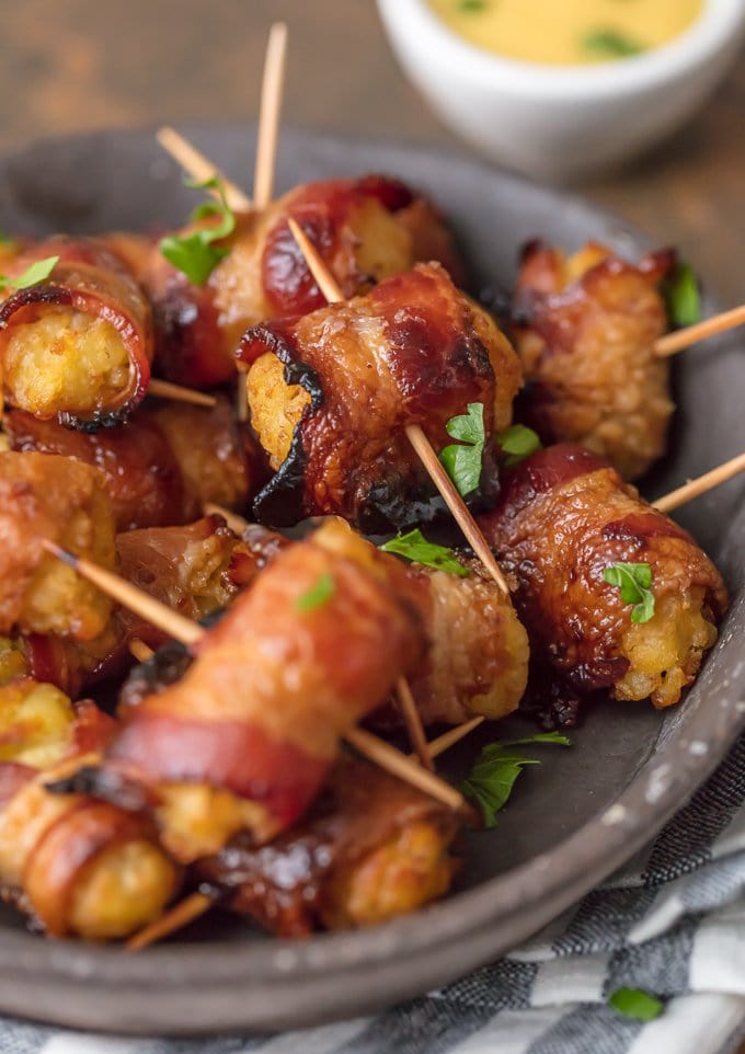 Bacon wrapped tater tots on a plate