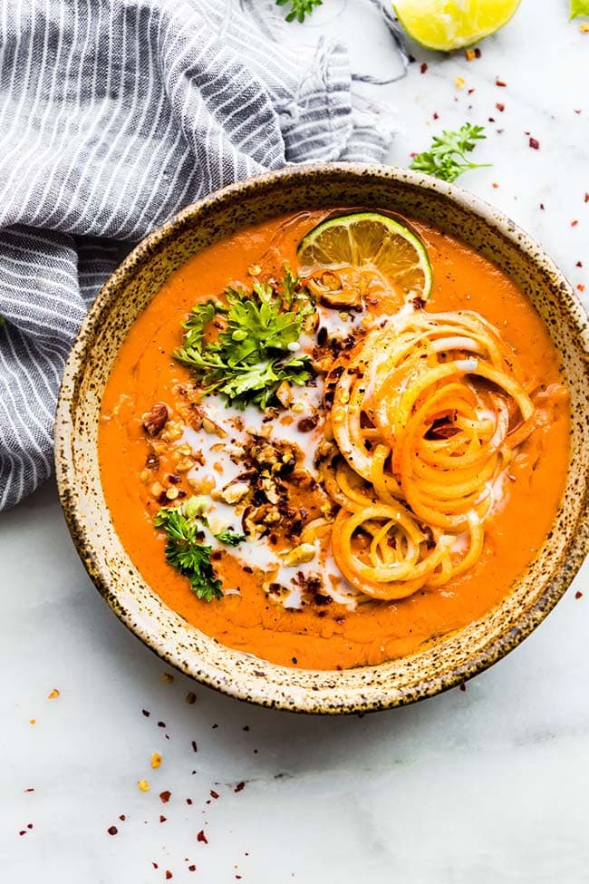 carrot tomato soup in a bowl
