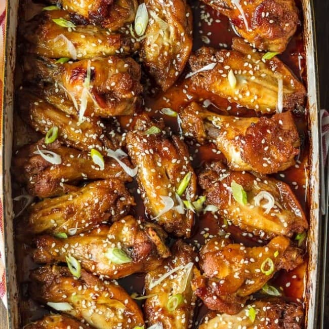 These SESAME BAKED WINGS are my go-to sticky wings recipe for game day. A little bit spicy and a little bit sweet, they're loved by all. You'll never miss deep frying your wings after you taste how amazing baked wings are!