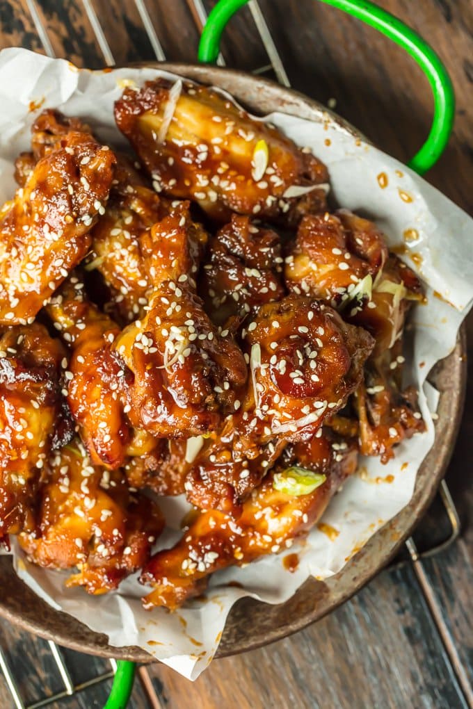 These BAKED STICKY SESAME WINGS are my go-to wing recipe for game day. A little bit spicy and a little bit sweet, they're loved by all. You'll never miss deep frying your wings after you taste how amazing they can be baked and not fried!