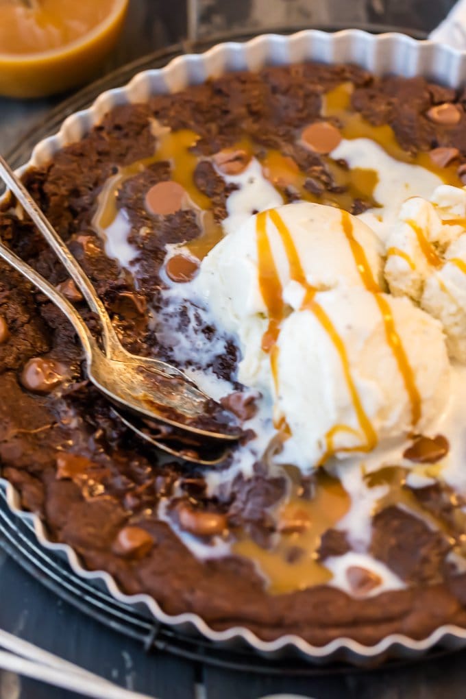 Giant sharing size cookie in baking pan with ice cream 