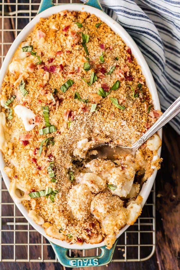 Cheesy Bacon Gnocchi Bake in a baking dish with a spoon