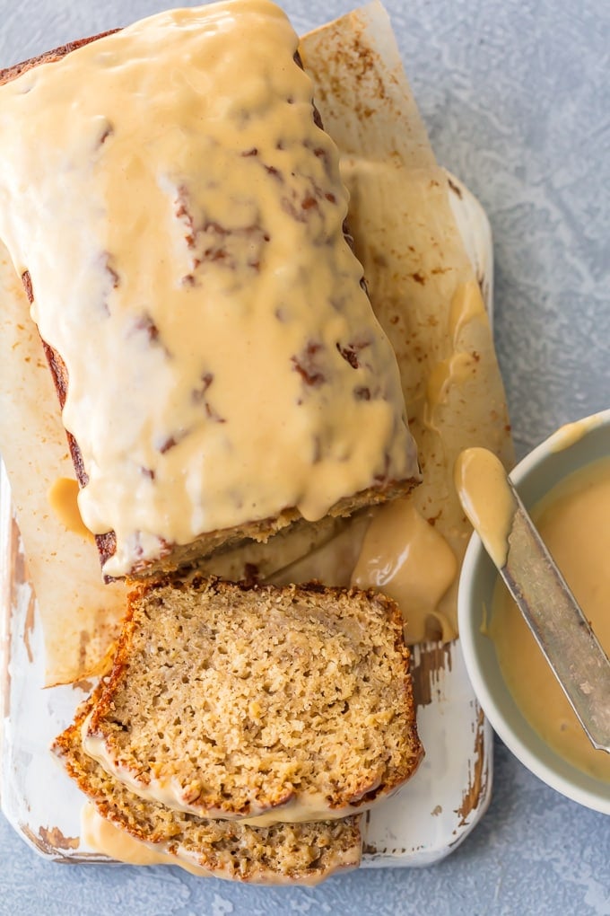 Top view of loaf of banana bread with glaze