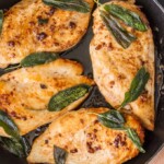 This BRINE CHICKEN BREAST with Garlic and CRISPY SAGE is one of our favorite easy meals for entertaining guests or a delicious night at home. You won't believe how tasty these simple garlic and sage chicken flavors are until you try them all together. The garlic brine makes the chicken SO TENDER and JUICY!
