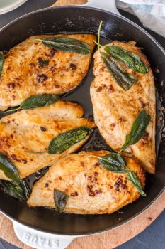 This BRINE CHICKEN BREAST with Garlic and CRISPY SAGE is one of our favorite easy meals for entertaining guests or a delicious night at home. You won't believe how tasty these simple garlic and sage chicken flavors are until you try them all together. The garlic brine makes the chicken SO TENDER and JUICY!