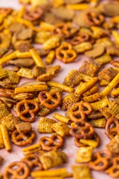 This recipe for HOMEMADE GARDETTO'S is a fun and easy way to make a delicious snack mix for your family! Love the flavor and that you can control all of the ingredients. Perfect for tailgating or holiday get togethers.