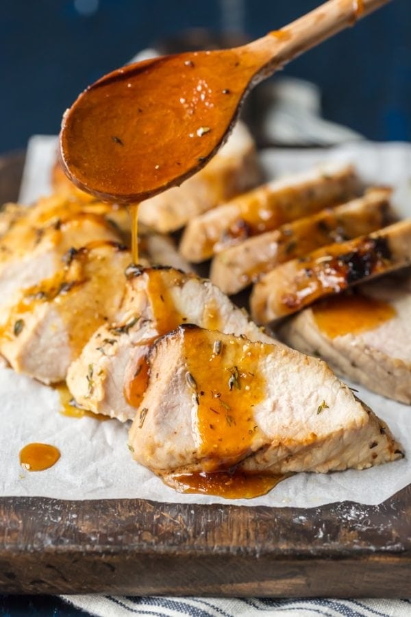 Pork Tenderloin with Honey and Herbs is a delicious and easy recipe! This HONEY HERB PORK TENDERLOIN RECIPE will change the way you feel about cooking pork. It's tender, juicy, full of flavor, and most importantly EASY! If you've wondered How to Make Pork Tenderloin while cooking the meat to perfection, this recipe is for you. Don't you just want to bathe in that sauce?