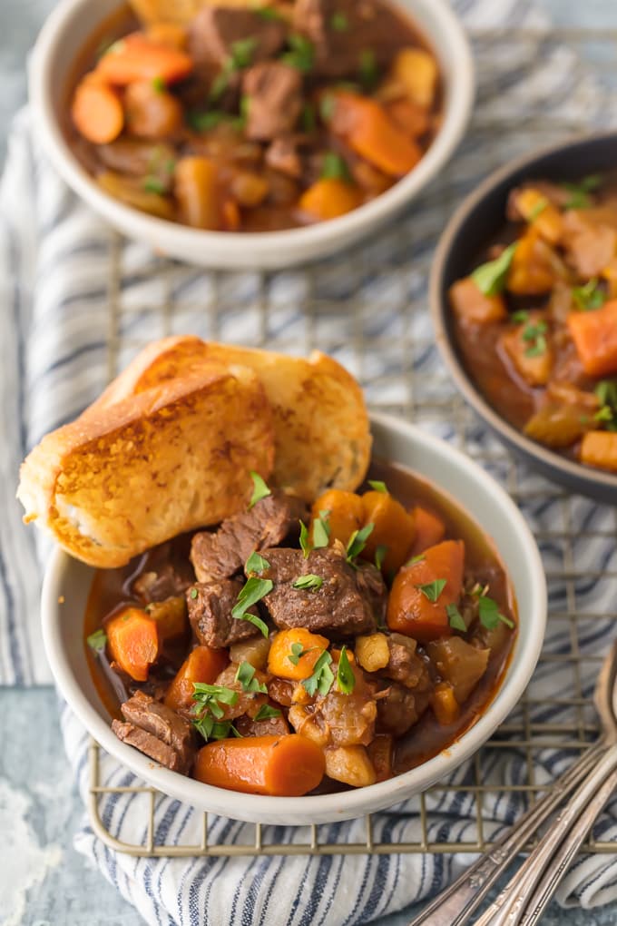 bowls of beef stew on table