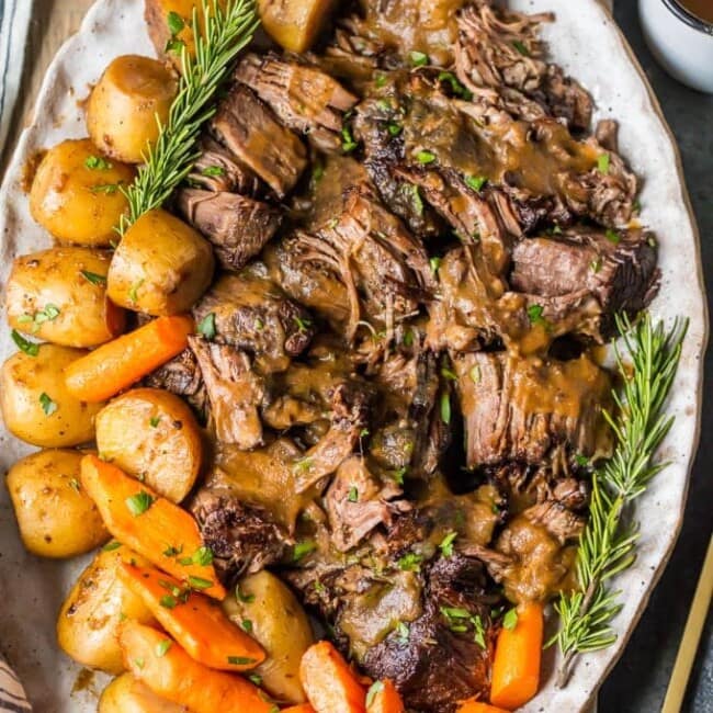 Instant Pot Pot Roast Recipe is the only recipe I need in life! Pot Roast is my absolute favorite! There's something about the tender meat, potatoes, carrots, and THAT SAUCE that is so comforting and delicious. This is the BEST POT ROAST RECIPE of all time. If you're in the mood for comfort food, you have to learn how to make this Pot Roast!