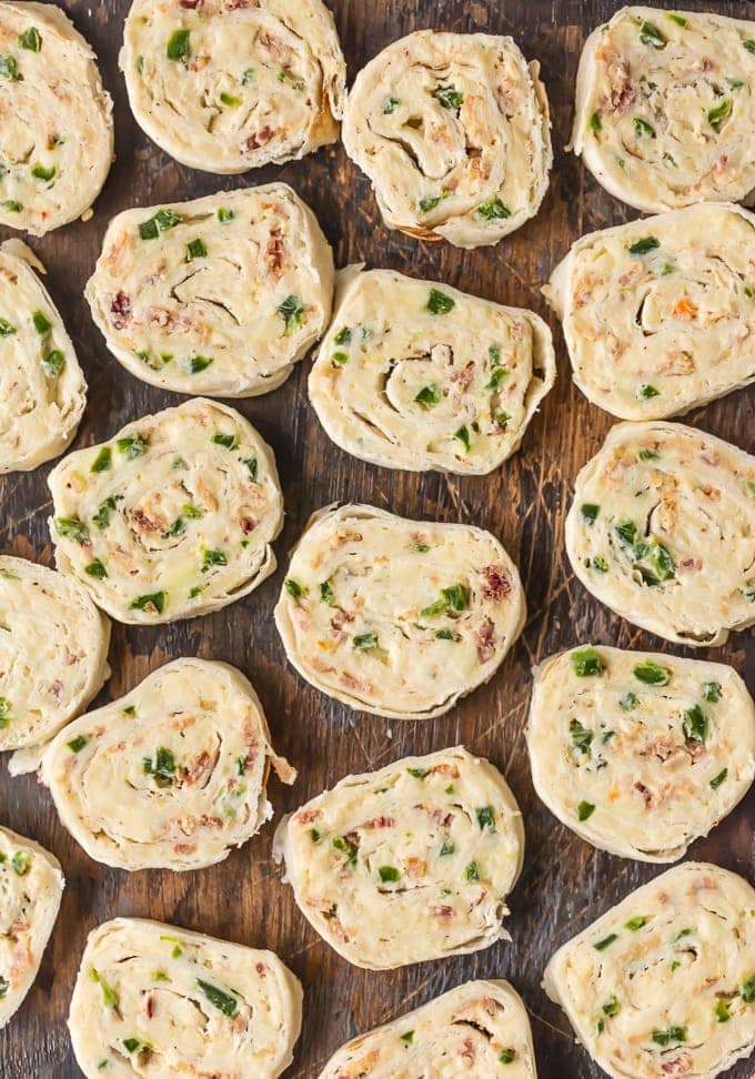 Tortilla roll ups with cream cheese, jalapeno, bacon, and cheese