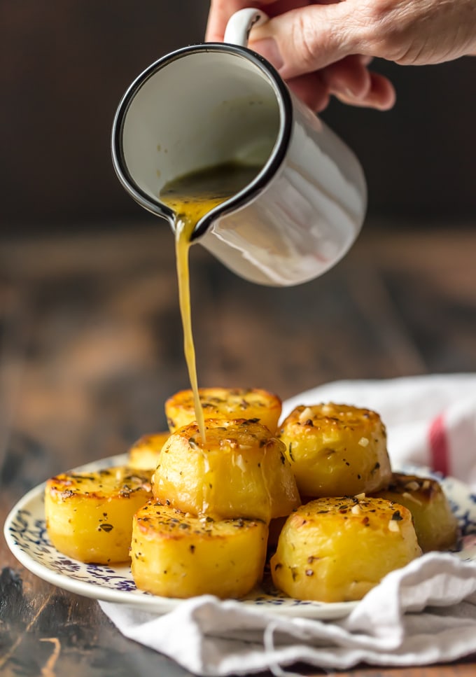 These OVEN ROASTED MELTING POTATOES are the ultimate side dish. Practically dripping butter, these soft and tender potatoes go with any and every meal and are sure to please. These are my very favorite potato side dish! It doesn't get better than this!