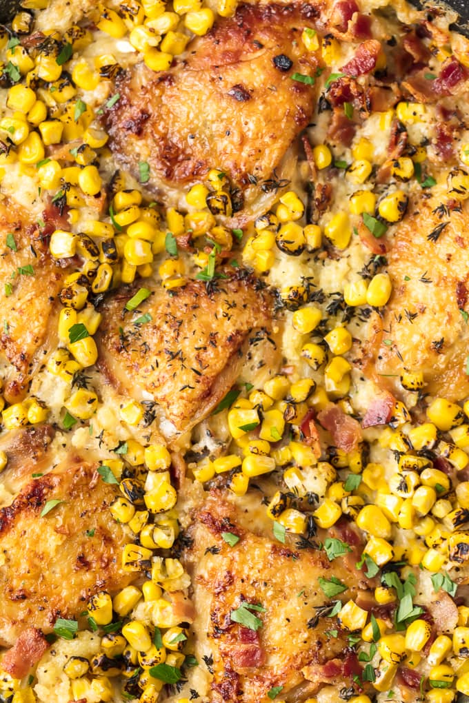 Close up on chicken and couscous with corn and bacon
