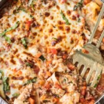 Weight Watchers Lasagna in a bowl with a spatula