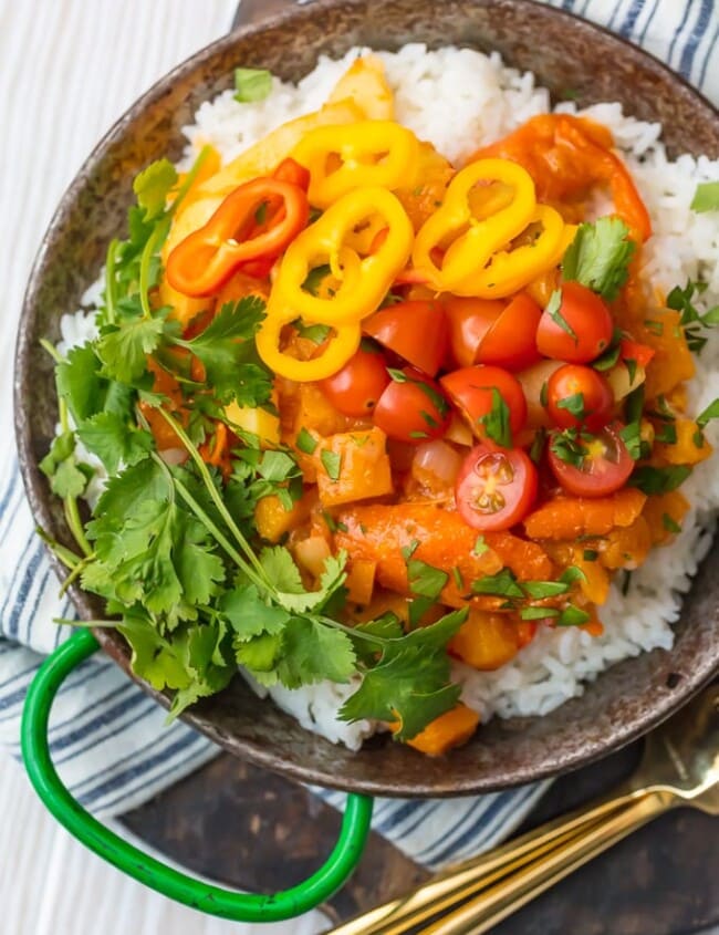 VEGETABLE CURRY is the perfect fresh and light vegetarian meal for these cooler temps! This Thai Curry Recipe has just the right amount of spice and all the colors of the rainbow make up this meal inspired by Indian flavors that the entire family will devour. If you've wondered how to make vegetable curry, it's so much easier than you might have thought. This recipe is great for meal planning!