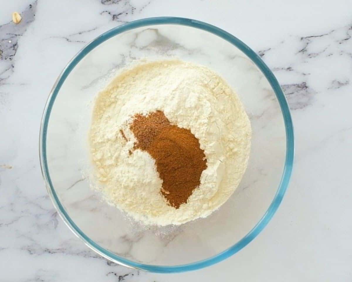 Combining the dry ingredients.