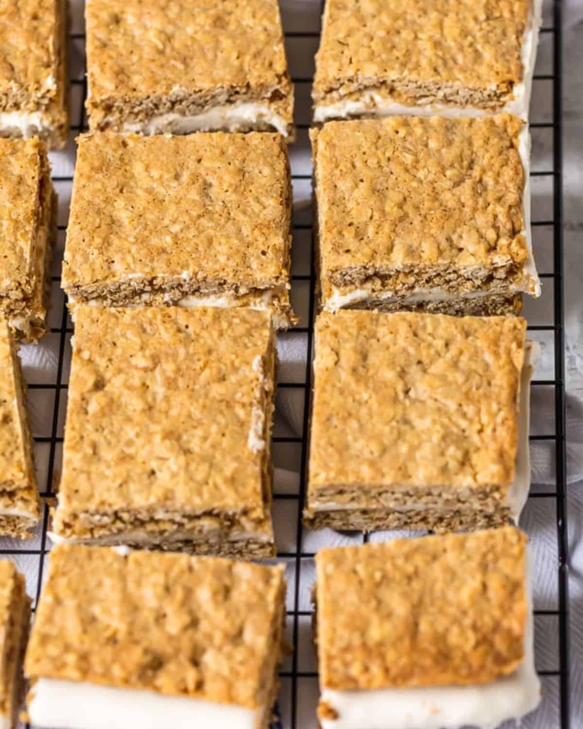 Oatmeal cream pies on a wire rack.
