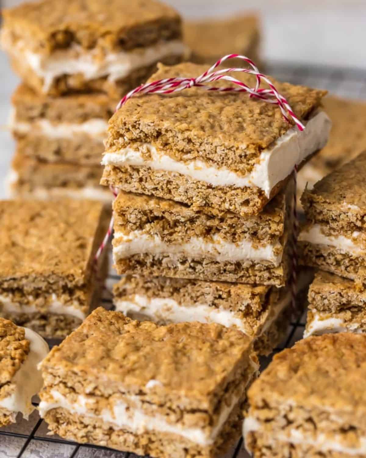 Squares of homemade oatmeal cream pies stacked.