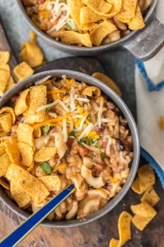 Instant Pot Chili Mac will be your new go-to favorite comfort food! This Chili Mac Recipe is loaded with beef, cheese, beans, tomatoes, and more, kids and adults alike will be back for seconds. We love to top ours with fritos, sour cream, and more cheese. There's nothing like a bowl of Chili Mac and Cheese on a chilly night.