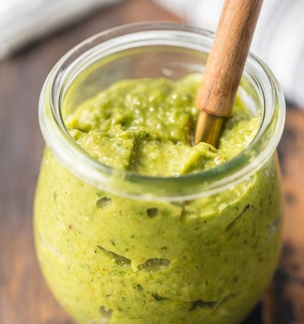 Basil Walnut Pesto is an amazing sauce full of basil, walnuts, olive oil, parmesan cheese, lemon juice, and garlic. This Homemade Pesto Sauce is the perfect topping for salmon, bruschetta, chicken, steak, and more. So much flavor and you can quickly make this Basil Pesto Recipe in a blender! 